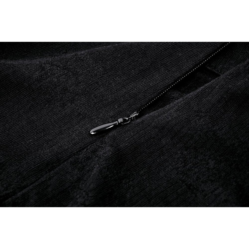 Model wearing the Dark In Love Izora Fishtail Skirt, demonstrating its flattering silhouette and elegant side opening.