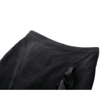 Dark In Love Izora Skirt displayed on a hanger, showcasing its unique fishtail design and stylish appearance.