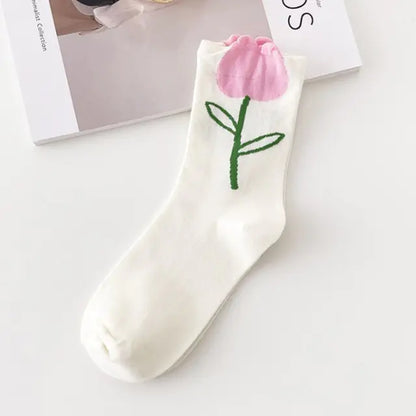Luxurious Women's Tie-Dye Middle Tube Socks featuring a delicate pink tulip design on a white background, perfect for adding a touch of elegance to your wardrobe.