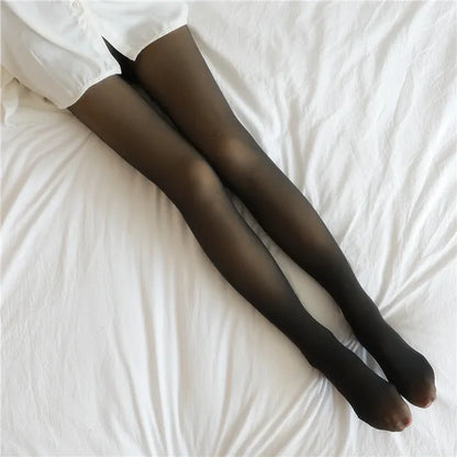 Elegant Women's Insulated Translucent Fleece Tights in black, showcased elegantly on a soft white bedding, highlighting their stylish warmth for all occasions.