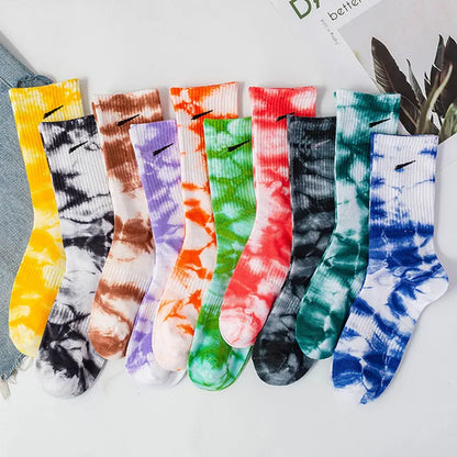 Close-up of Luxurious Women's Tie-Dye Middle Tube Socks in an array of colours, highlighting the bold designs perfect for vibrant comfort and stylish expression.