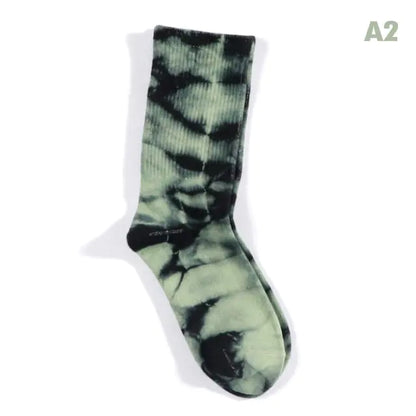 Luxurious Women's Tie-Dye Middle Tube Socks showcasing a bold and stylish black and green tie-dye pattern, ideal for vibrant all-day comfort.