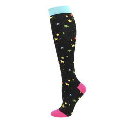 Women's Knee Length Compression Travel Socks with a vibrant star design, providing exceptional comfort and stylish flair for travel adventures.