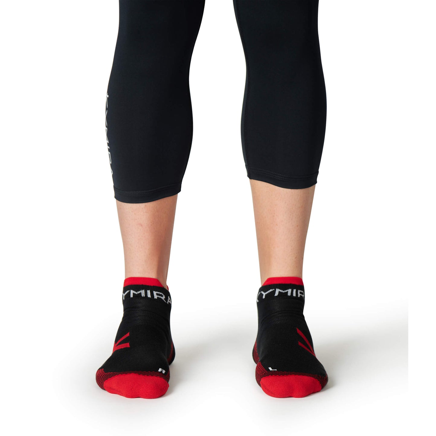 KYMIRA ankle socks in various sizes displayed elegantly, highlighting their cushioned heels and toes for superior comfort during workouts.