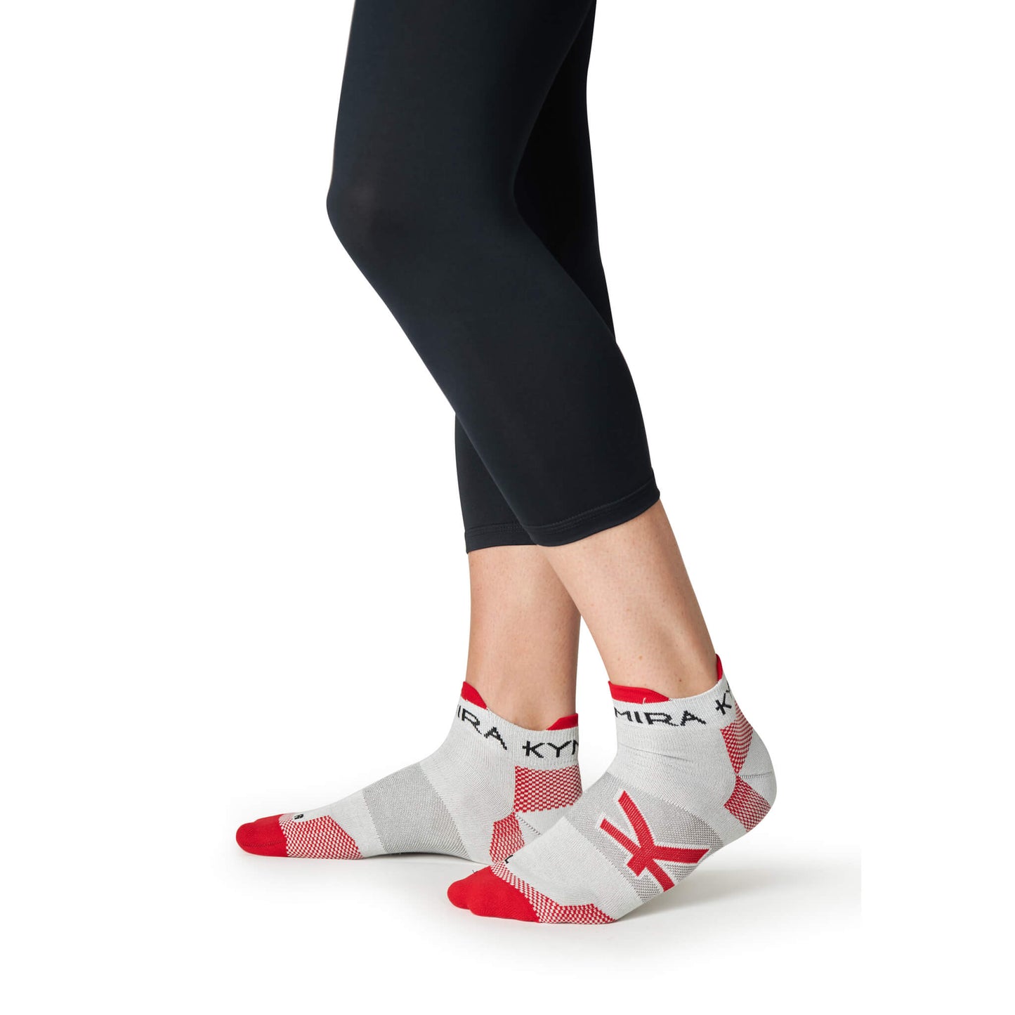 Elegant KYMIRA Infrared Ankle Socks showcasing ergonomic design with ribbed cuffs, ideal for enhanced support and injury prevention.