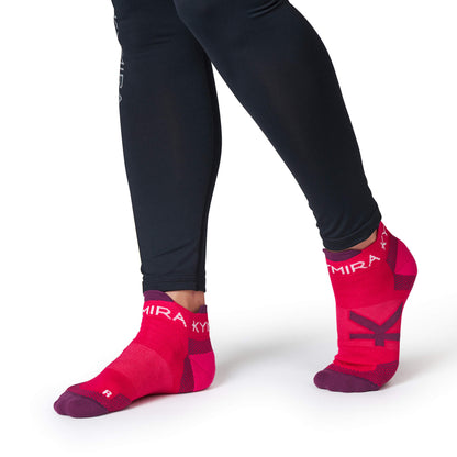 KYMIRA Infrared Ankle Socks demonstrating superior arch support and a higher ankle design for an enhanced fit during physical activities.