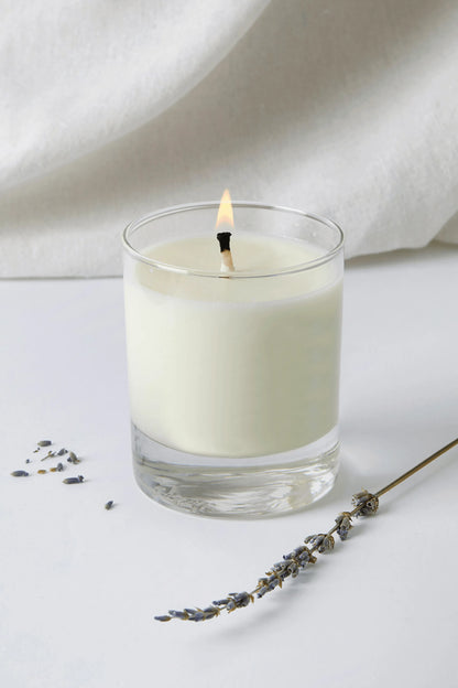 Elegant Lavender Essential Oil Soy Wax Votive Candle, hand-poured in a stylish glass jar for luxury relaxation.