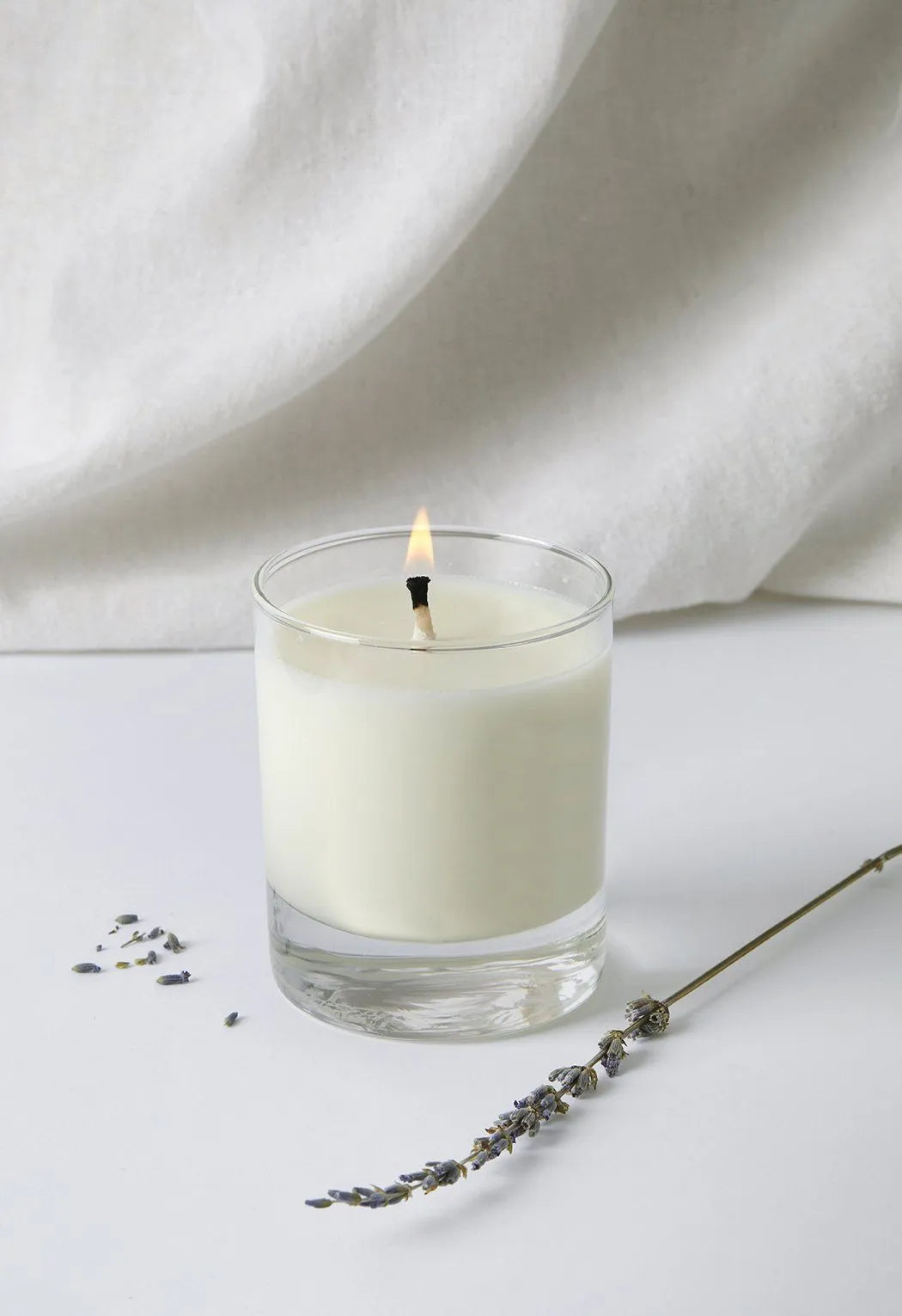 Beautiful Lavender Essential Oil Candle with an elegant design, perfect for gifts or home decor, providing soothing fragrance and ambience.