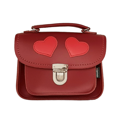 Luna Handmade Leather Crossbody Bag in vibrant red with appliqued love hearts, showcasing its elegant craftsmanship and versatile design, perfect for stylish outings.