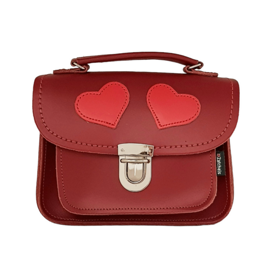 Luna Handmade Leather Crossbody Bag in vibrant red with appliqued love hearts, showcasing its elegant craftsmanship and versatile design, perfect for stylish outings.