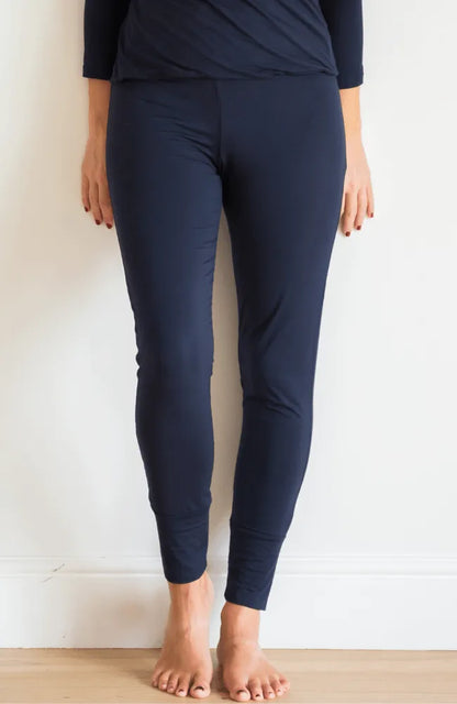Model wearing luxurious women's micro modal yoga trousers, perfectly fitted and stylish, ideal for various activities, from yoga to relaxing at home.