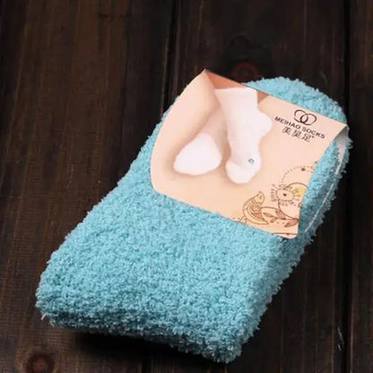 Stylish Women's Bed Socks in a tranquil blue tone, fluffy and warm, perfect for a luxurious winter wardrobe addition.