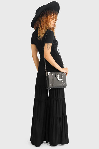 Close-up detail of Killstar Maleficum Trousers featuring functional pockets and an elasticated waistband for effortless style and comfort.