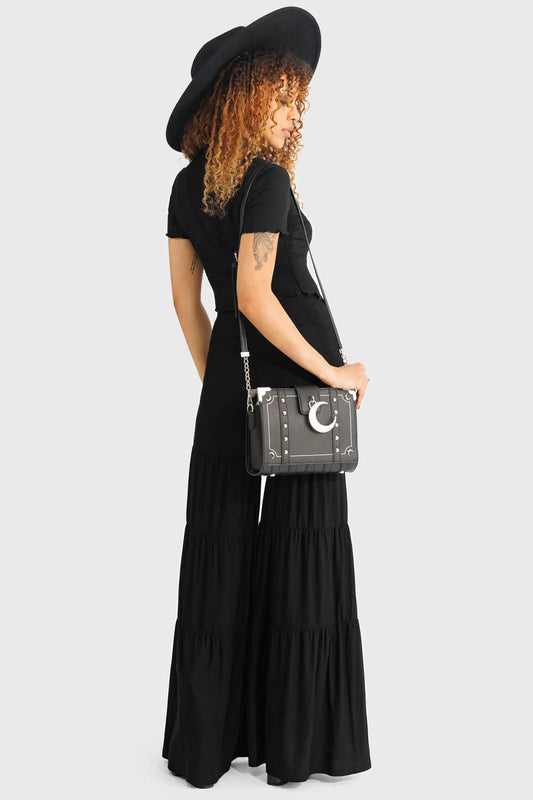 Close-up detail of Killstar Maleficum Trousers featuring functional pockets and an elasticated waistband for effortless style and comfort.