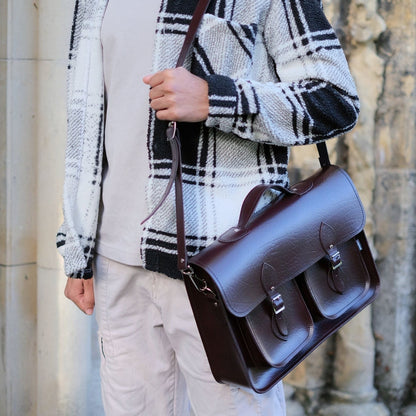 Stylish presentation of the Luxury Leather Satchel with a detachable shoulder strap, highlighting its versatility and comfort for modern professionals.