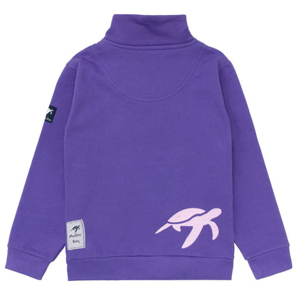 Elegant half zip detail of the Children's Indigo Haze West Coast Sweatshirt, highlighting a plush brushed lining and signature embroidered Mullins turtle accent on the left chest for a stylish and comfortable layering option.