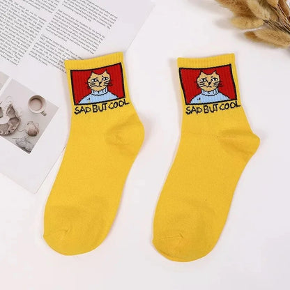 Stylish Hip Hop Long Socks for Women & Girls in yellow with a cute cartoon cat print, perfect for adding a trendy touch to your wardrobe while ensuring comfort.