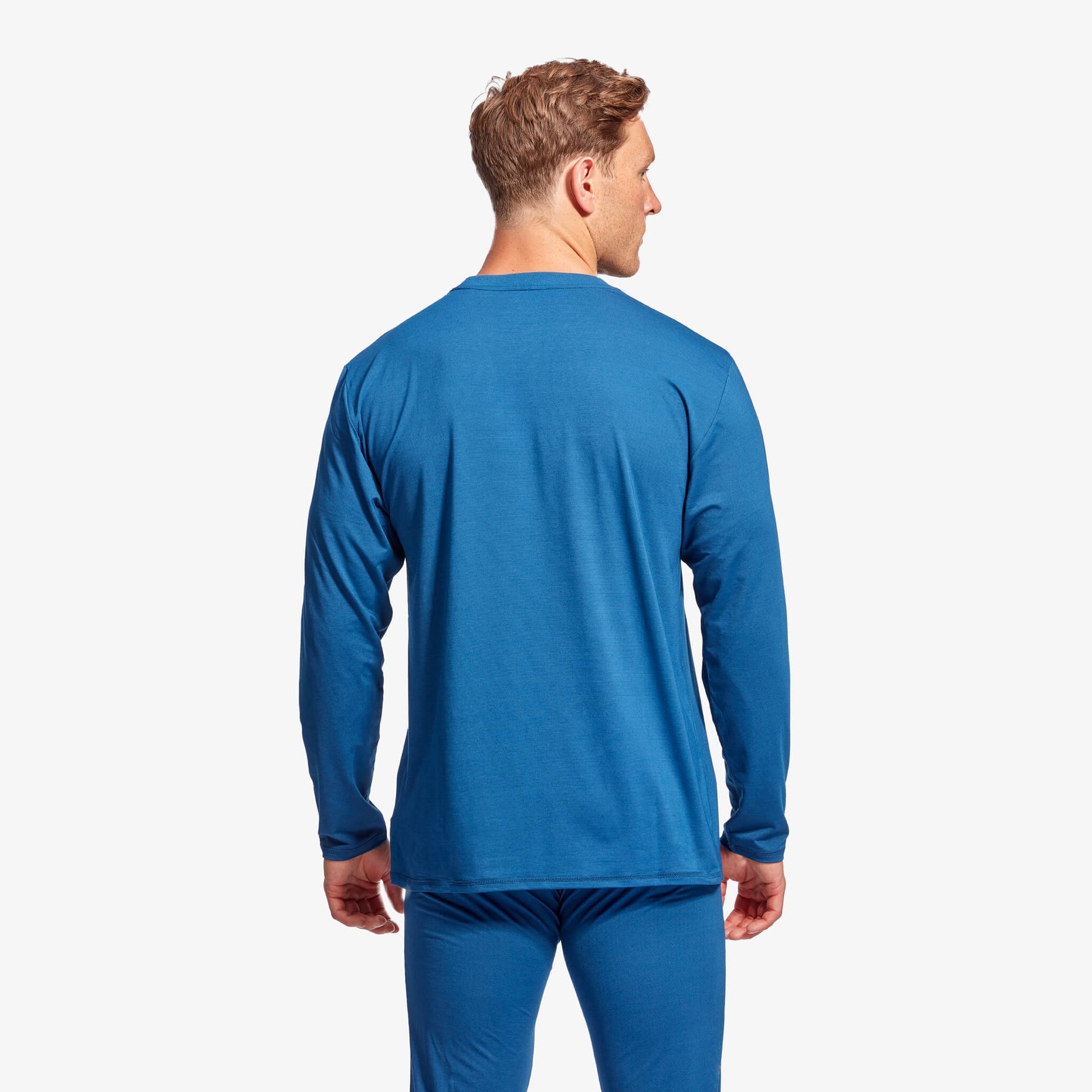 Stylish KYMIRA Men's Infrared Recovery Sleepwear Top displayed in vibrant colour, designed with Celliant® technology for enhanced sleep quality and rejuvenation.