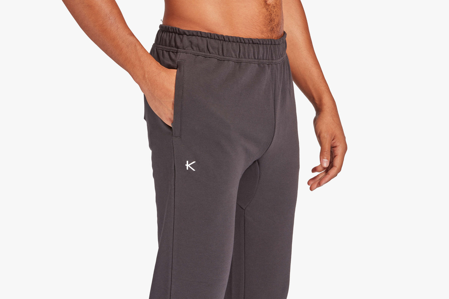 KYMIRA Men's Infrared Recovery Tracksuit Bottoms with open ankle design, emphasizing elegance and function for the discerning athlete.