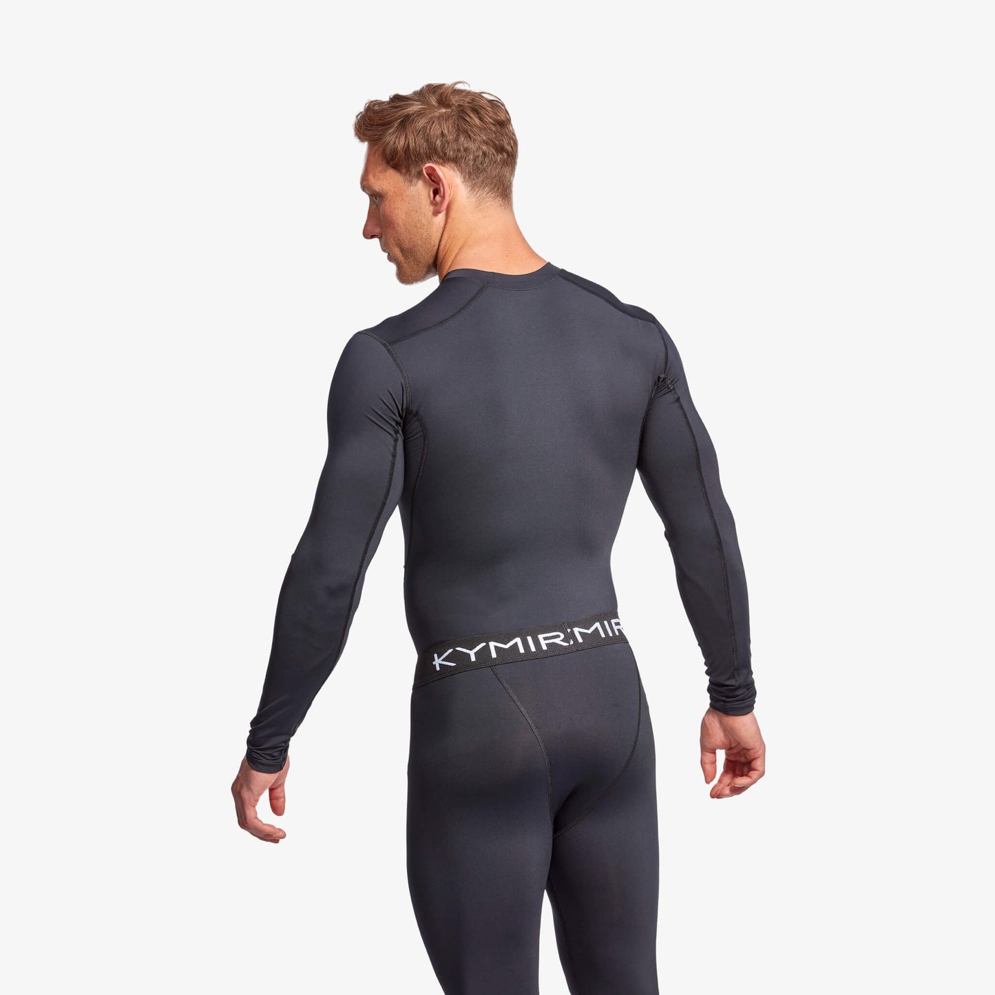 KYMIRA Men's IR50 Long Sleeve Top displayed in various sizes XS to XXL, highlighting its stylish design and advanced infrared technology for enhanced recovery.