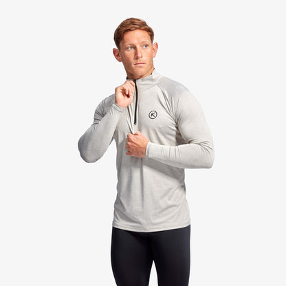 KYMIRA Men's Infrared 1/4 Zip Long Sleeve Top in sleek ergonomic design, showcasing premium fabric and innovative KYnergy technology for enhanced performance and recovery.