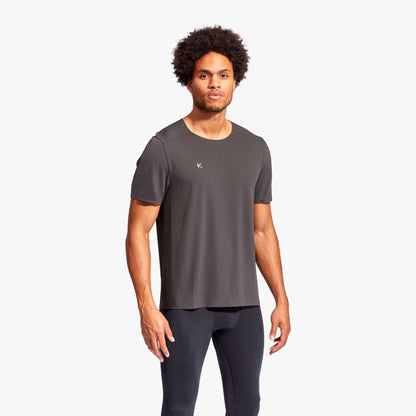 Luxurious men's KYMIRA Charge infrared performance t-shirt in lightweight, breathable fabric, showcased in a stylish presentation.