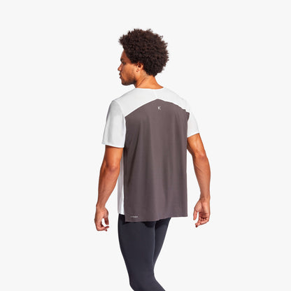 Close-up view of the KYMIRA Charge T-Shirt's seamless open neck design, enhancing breathability and comfort for athletic wear.