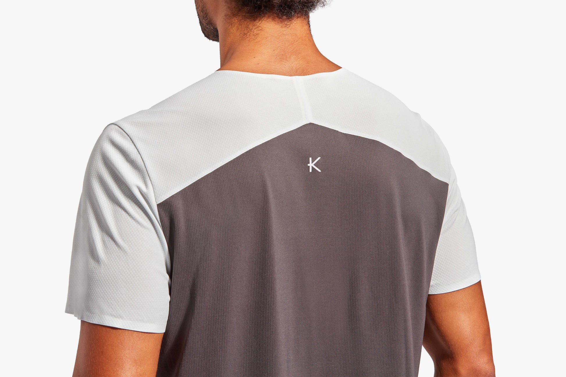 Display of the Men's KYMIRA Charge Infrared Performance T-Shirt available in multiple sizes from S to XXL, combining style with functionality.