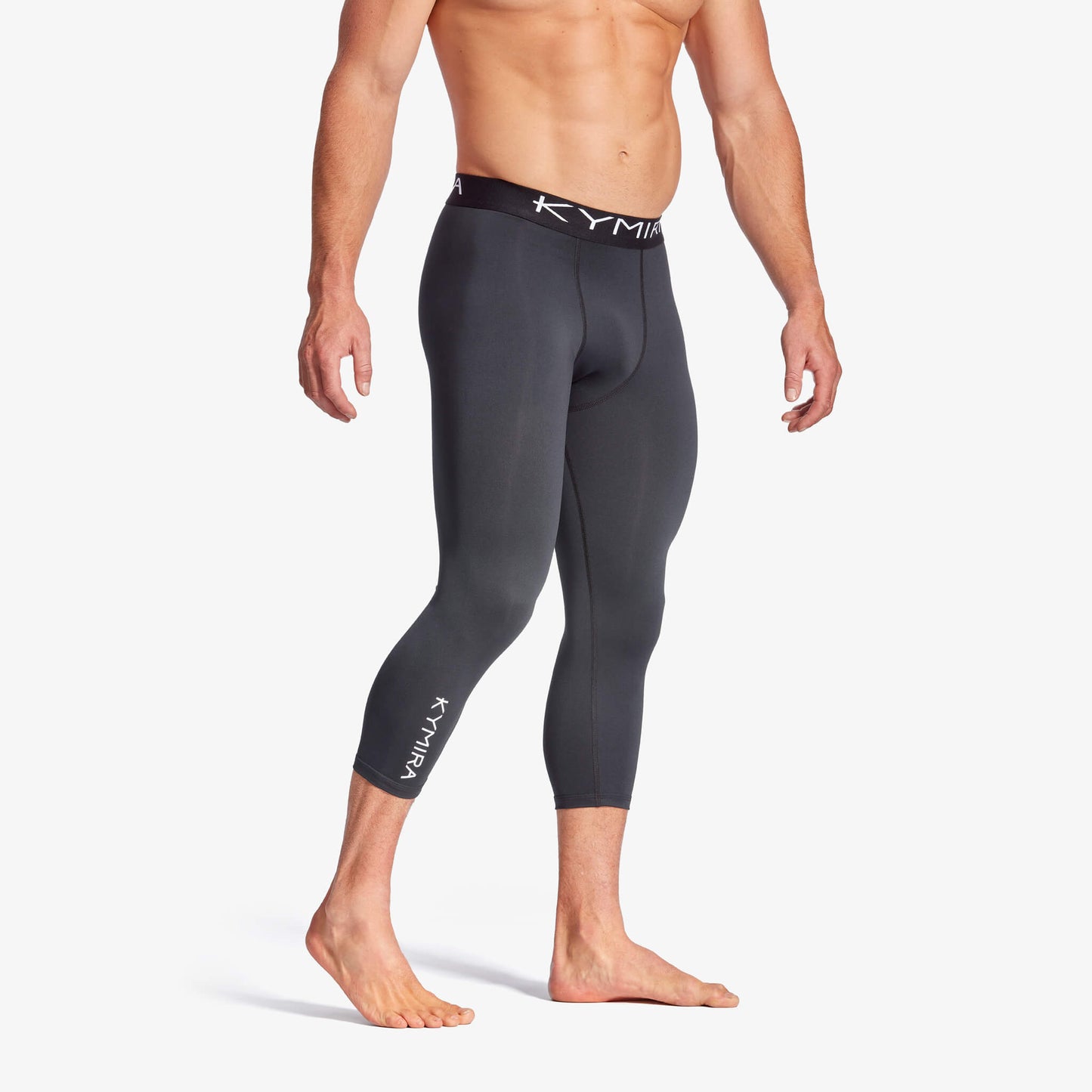 Men's KYMIRA Infrared Leggings in a dynamic sports setting, emphasising their fitted design perfect for active lifestyles and winter sports.