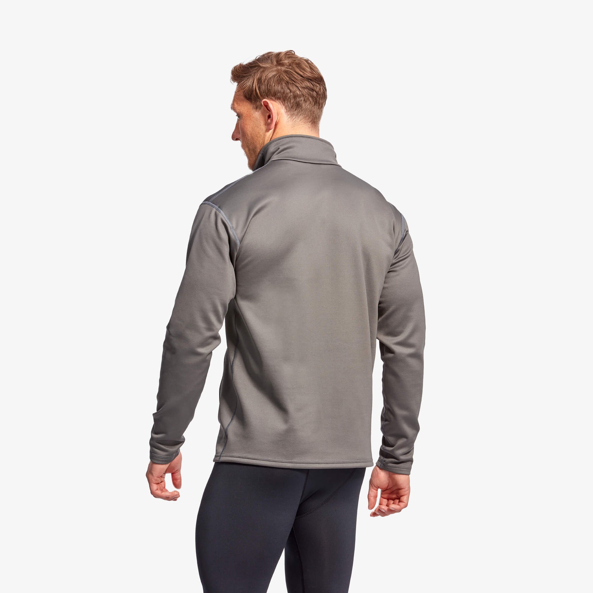 Close-up of KYMIRA Half Zip Fleece showcasing brushed inner fleece, enhancing comfort and performance.