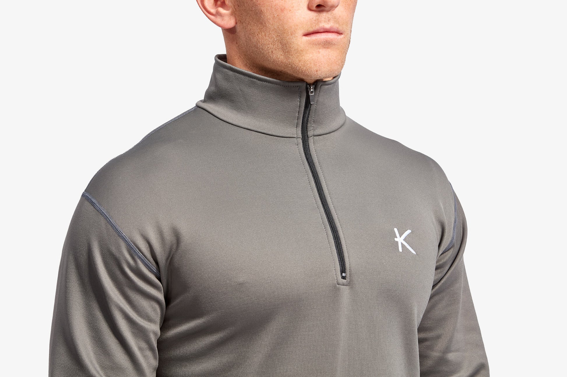 Detail of the zip lock neck on KYMIRA Half Zip Fleece, ensuring temperature regulation for ultimate comfort.