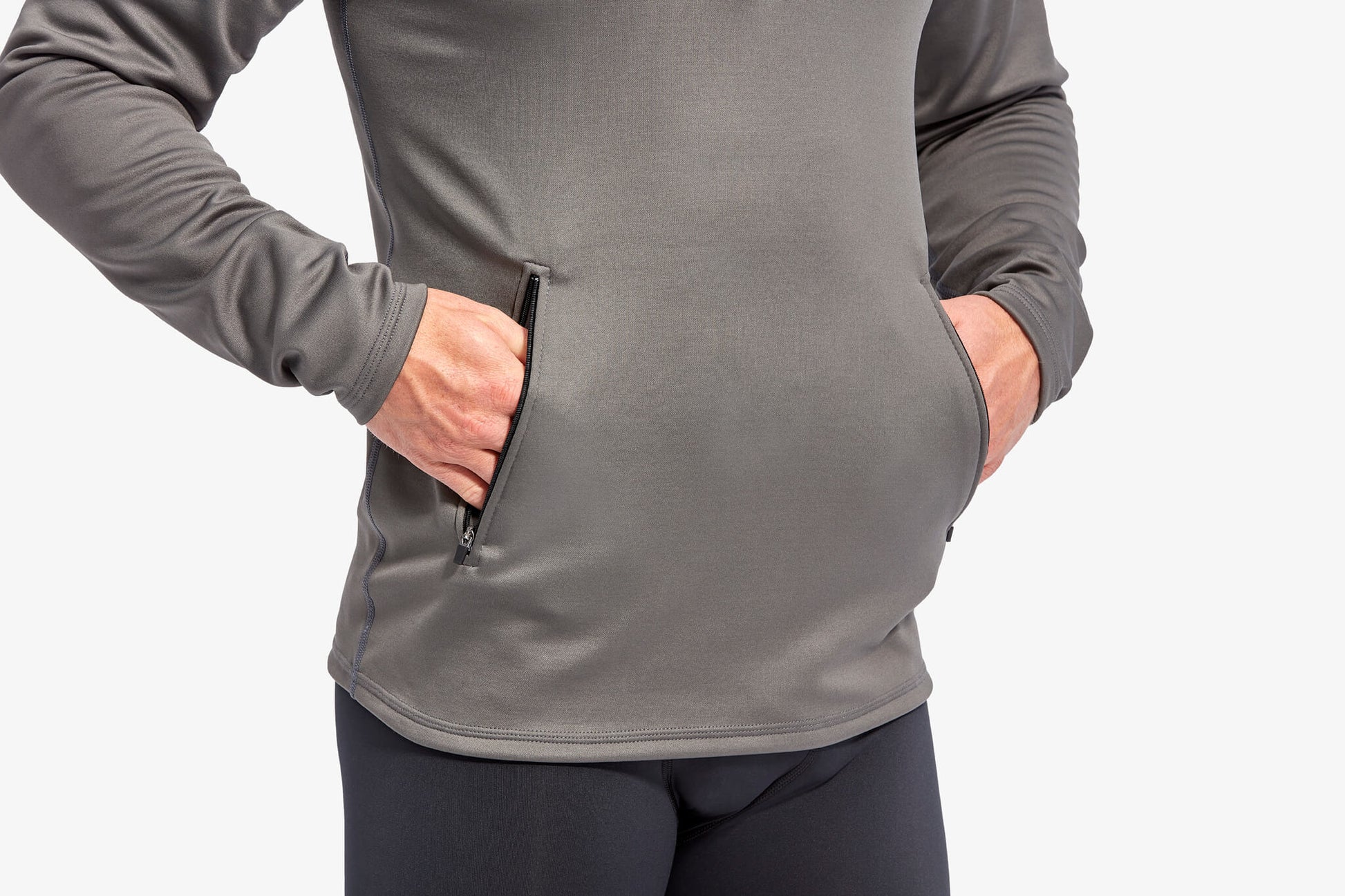 Men's KYMIRA Infrared Fleece with secure zip pockets, perfect for athletes seeking functionality and elegance.