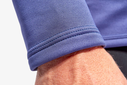 Stylish men's KYMIRA Infrared Infracycle™ Half Zip Fleece, designed with premium materials and advanced KYnergy technology, ensuring warmth and comfort during workouts and adventures.