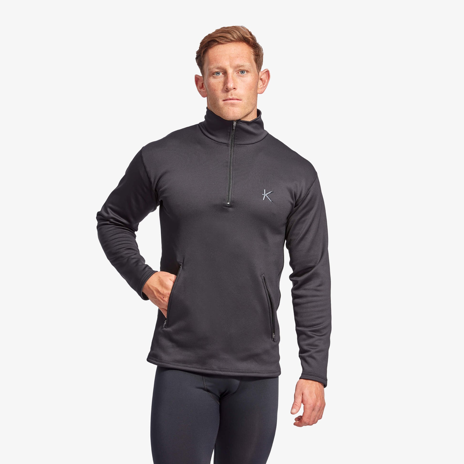 Model sporting the KYMIRA Infrared Infracycle™ Half Zip Fleece, demonstrating the perfect blend of comfort, style, and advanced technology, ideal for active lifestyles or casual wear.