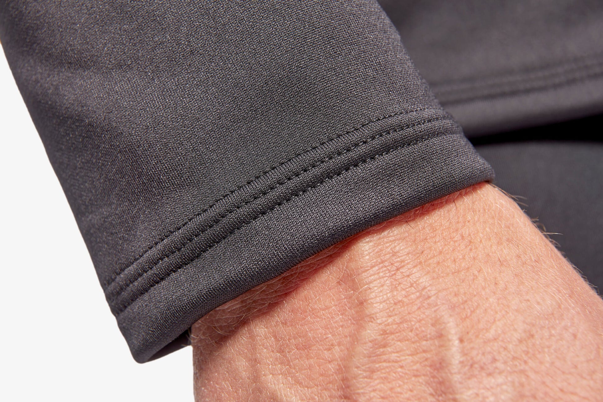 Men's KYMIRA Infrared Infracycle™ Half Zip Fleece in action, ideal for outdoor adventures and gym workouts.