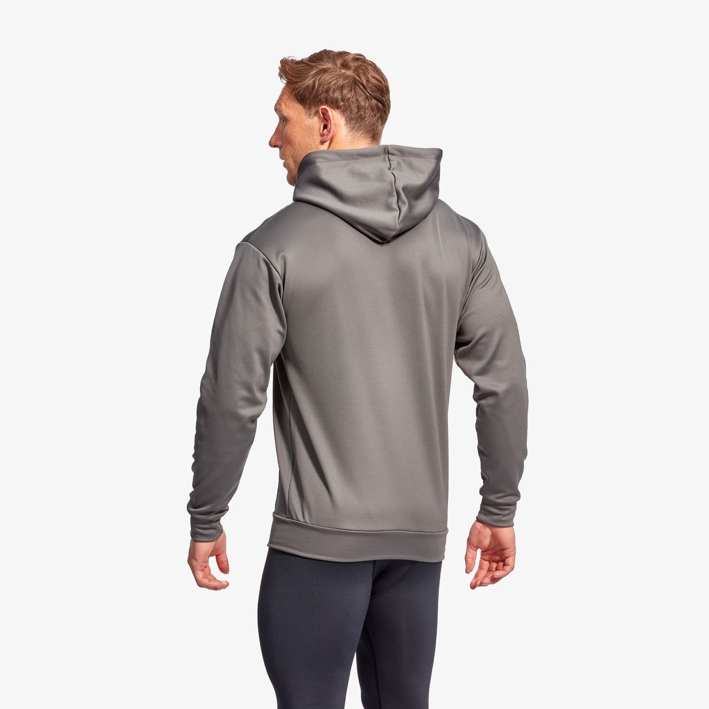 Stylish active fit of the KYMIRA Infrared Hoodie displayed on a model, highlighting the sophisticated design tailored for comfort and performance.