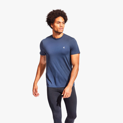 Detailed view of KYMIRA Men's Infrared Recovery T-Shirt highlighting structured panels for enhanced mobility and recovery during physical activities.