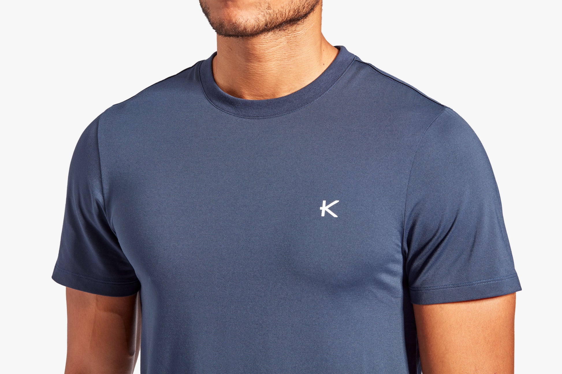 Close-up image of KYMIRA Men's Infrared Recovery T-Shirt's luxurious fabric texture, designed to enhance recovery and elevate athletic performance.