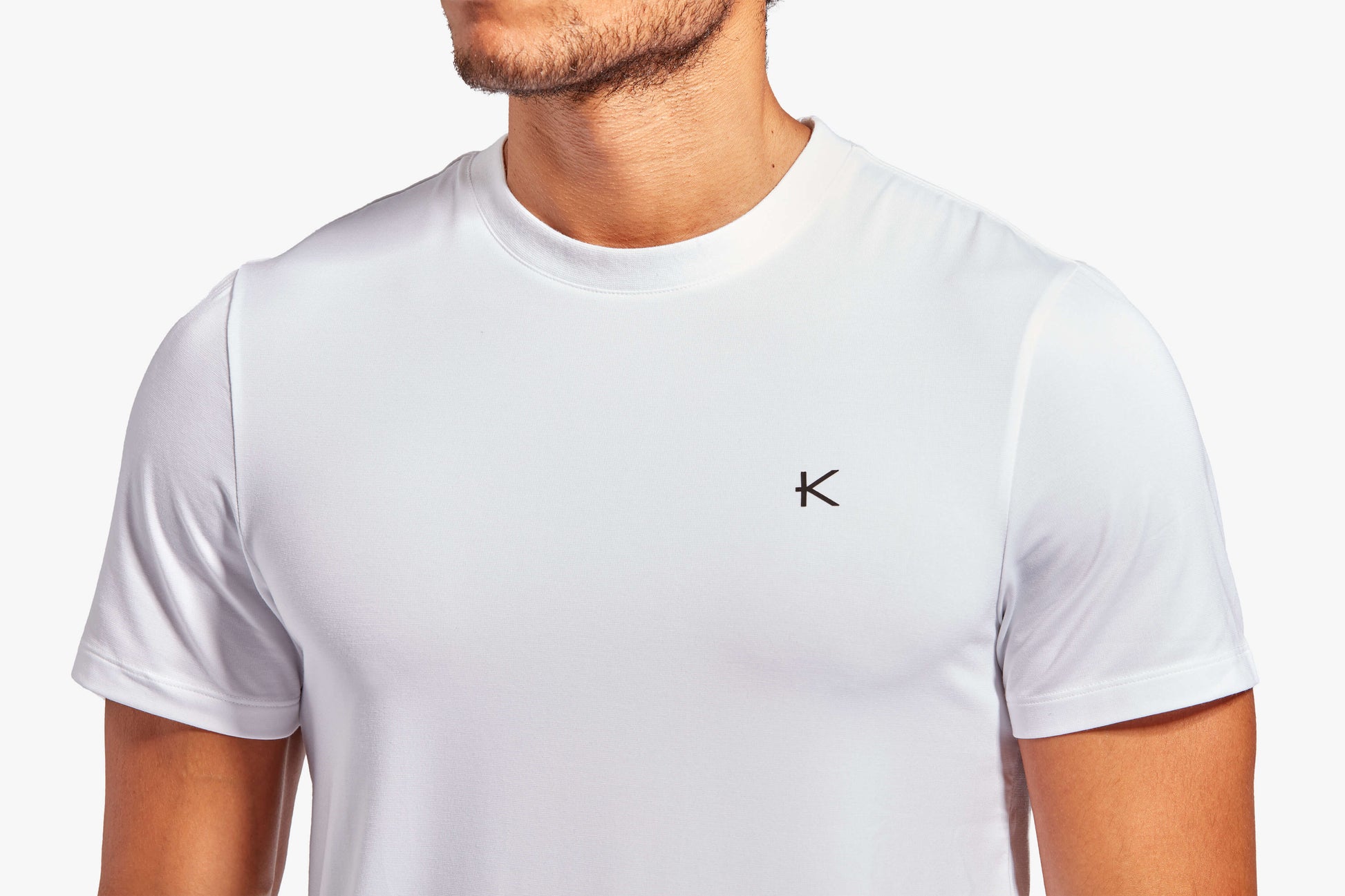 Back view of KYMIRA Men's Infrared Recovery T-Shirt, illustrating its ergonomic design and comfort features suitable for high-performance wear.