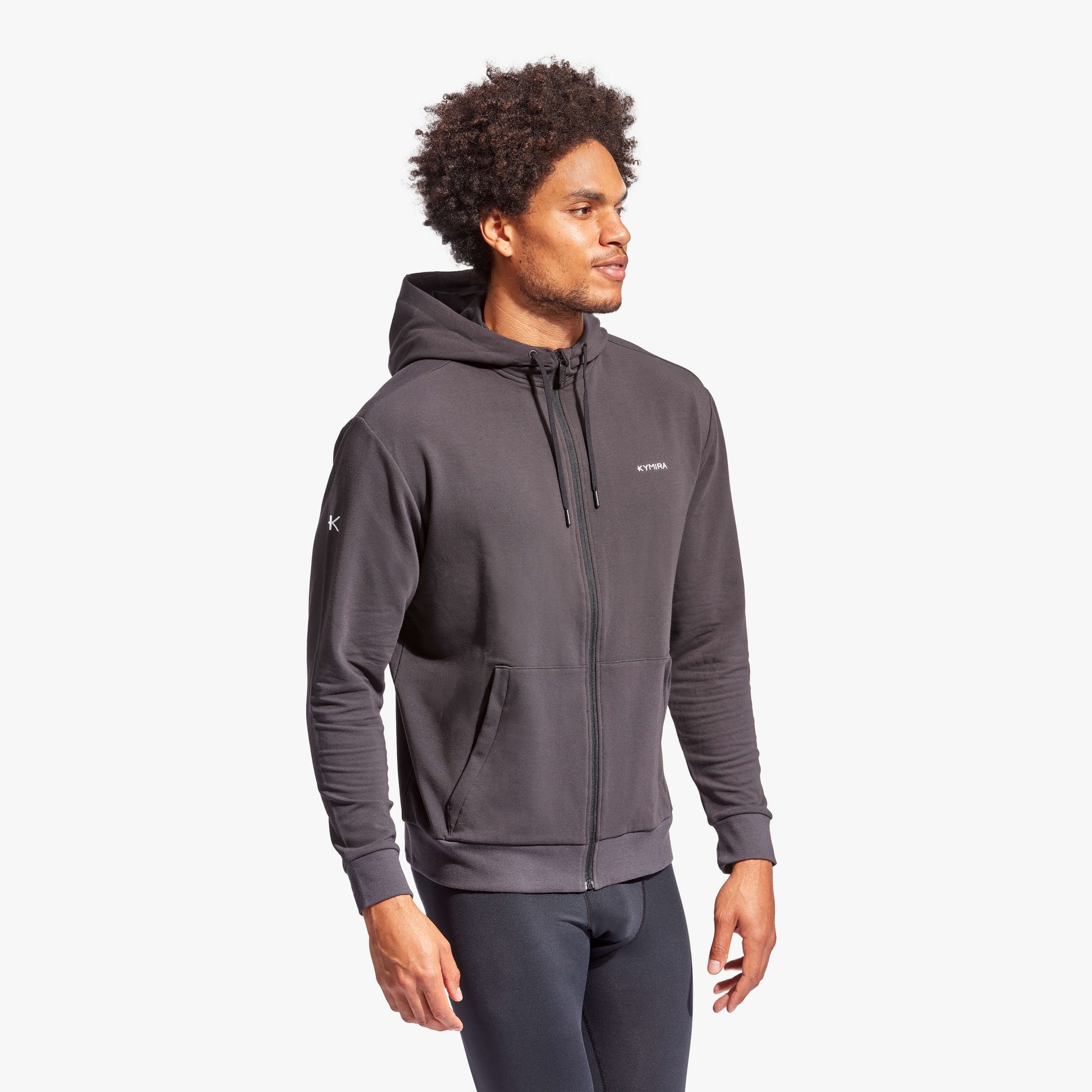 Stylish Men's Celliant Infrared Recovery Tracksuit Top by KYMIRA featuring a full zip and drawstring hood, perfect for enhancing recovery post-training.