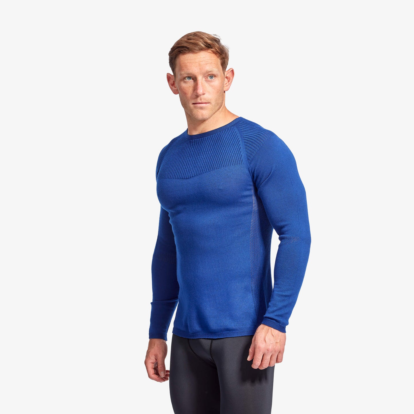 Men's KYMIRA Infrared Merino Wool Baselayer Top elegantly designed for ultimate fit, breathable and quick-drying, showcasing the luxurious texture and detailing of the fabric.