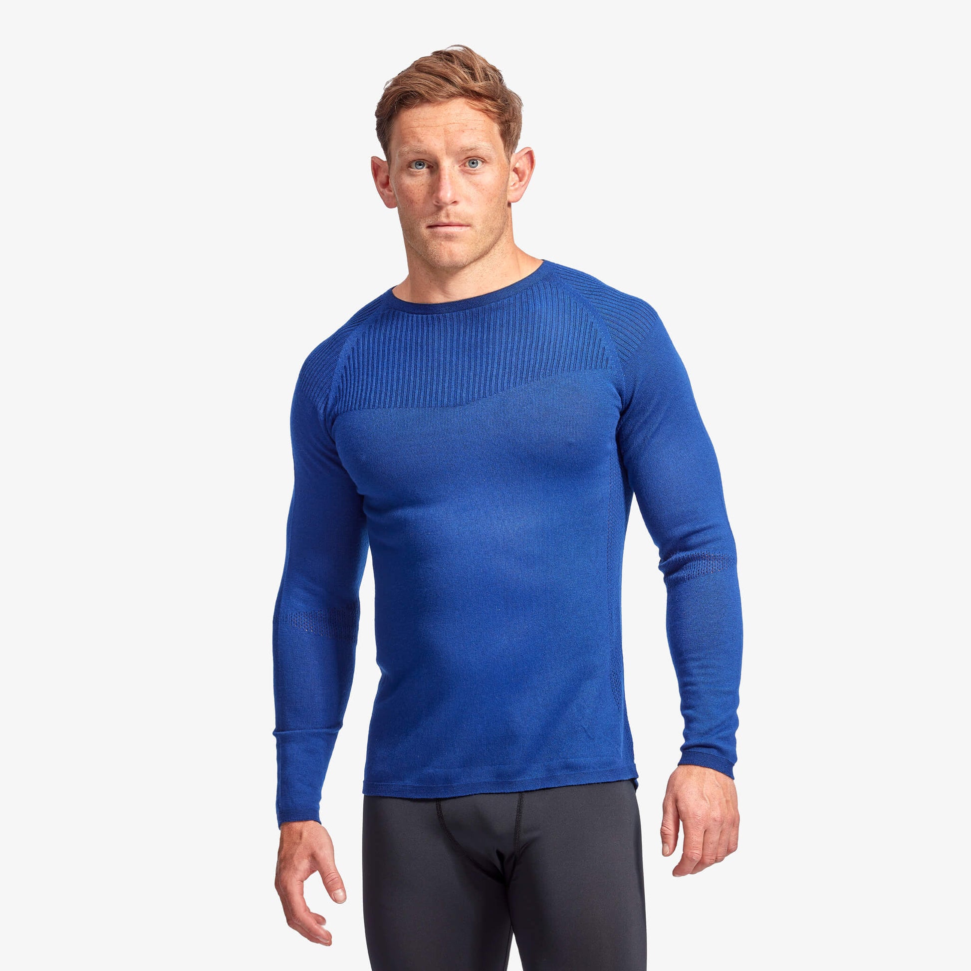Sophisticated Men's KYMIRA Infrared Merino Wool Baselayer Top in action, highlighting the cooling zones and seamless design that provide unmatched comfort during performance.