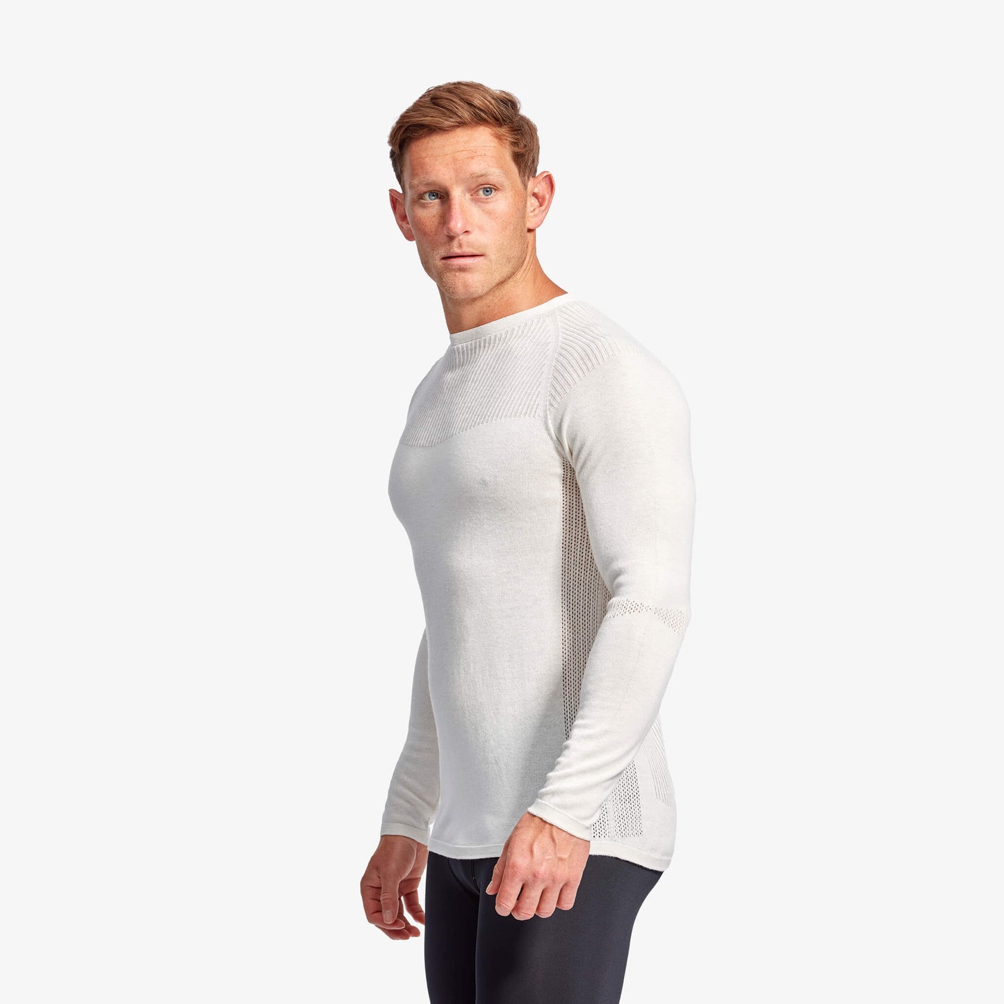 Stylishly displayed KYMIRA Men's Infrared Merino Wool Baselayer Top in a vibrant colour, highlighting its sustainable Merino wool fabric and advanced thermoregulation technology.