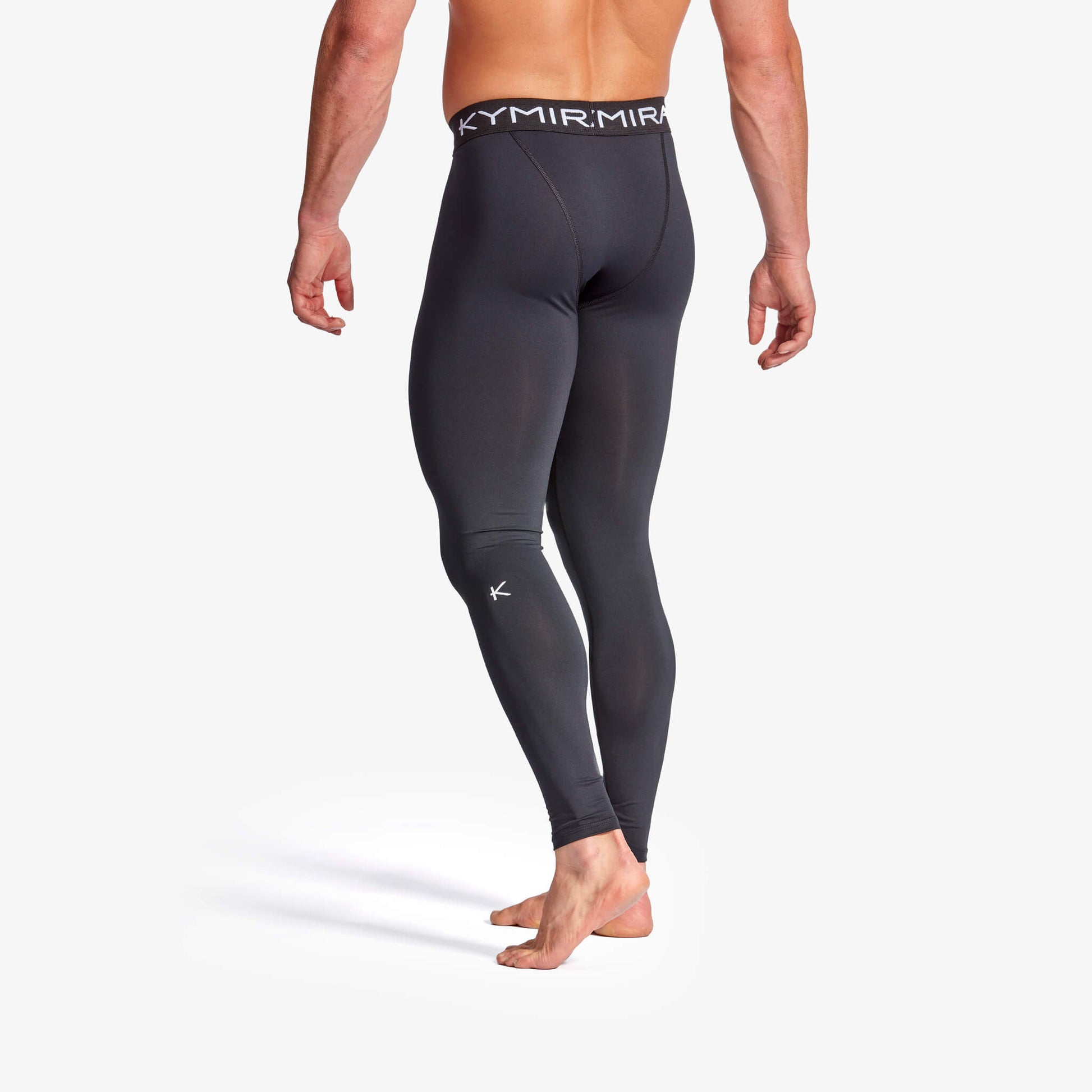 Men's KYMIRA Infrared Performance Leggings in various sizes, highlighting the technology that regulates body temperature and promotes recovery.