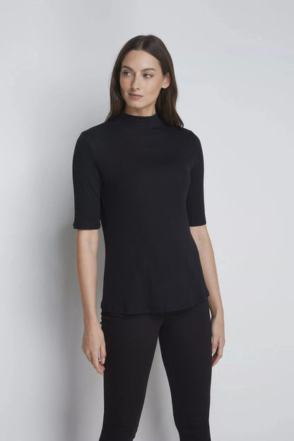 Women's Mock Neck Micro Modal Top in a chic black colour, draped elegantly against a stylish backdrop, perfect for transitional dressing.
