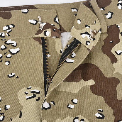 Close-up of the fabric and detailing on Women's Luxury Camouflage Mini Skirt by Dazzling Dreams Studio, featuring button and zipper fly.
