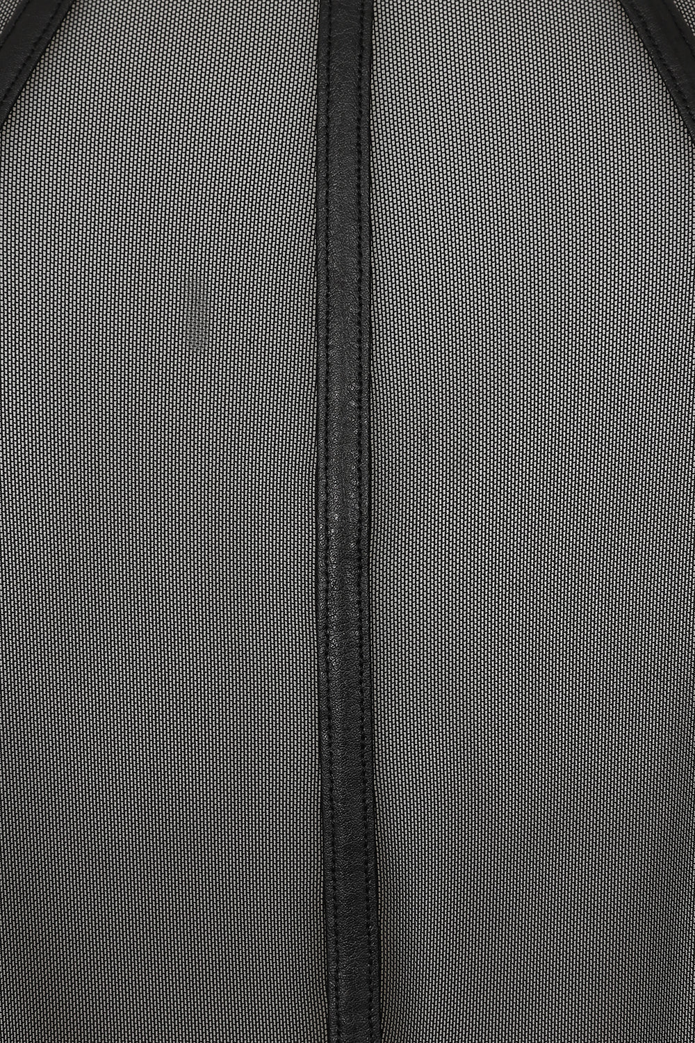 Elegant model wearing Necessary Evil Leutogi Black Mesh Bat Wing Cape Top, demonstrating its chic design and stylish silhouette with keyhole fastening.