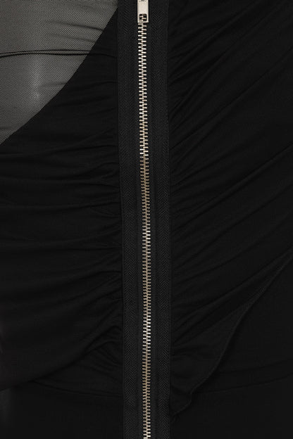 Close-up shot of the studded details on the waistband of Necessary Evil Venus Wrapped Mesh Mini Dress, highlighting the edgy craftsmanship.