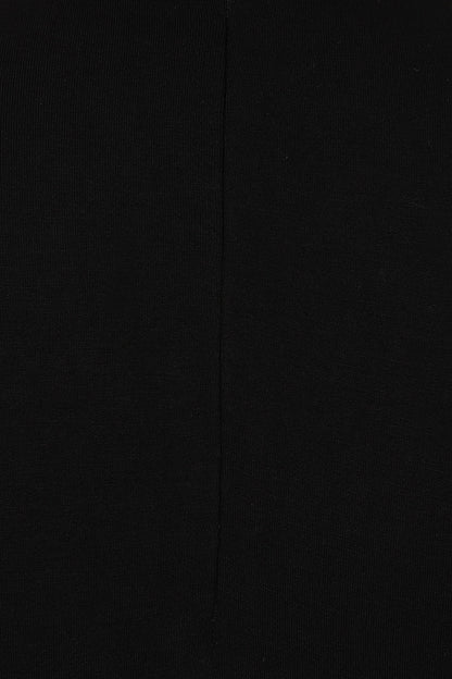 Model wearing the Necessary Evil Kali Gothic Midi Dress, demonstrating its flattering silhouette and versatile styling for both day and night occasions.