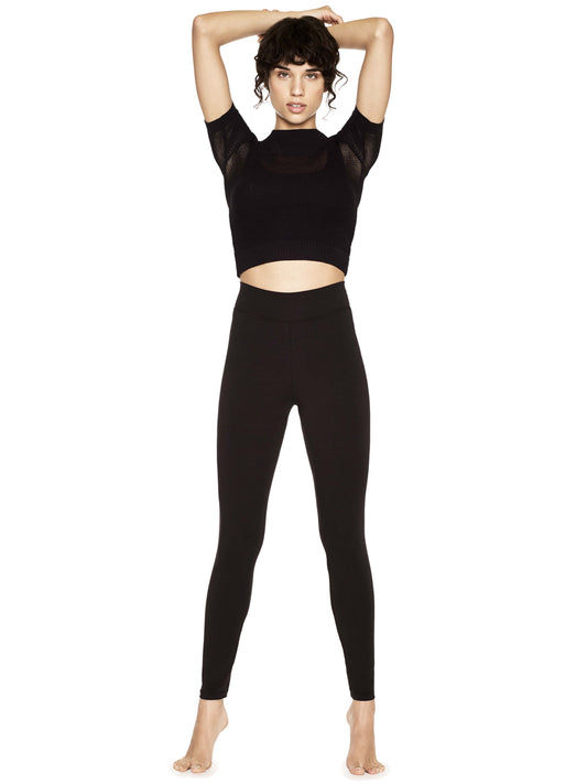 Luxury women's organic cotton leggings in soft black, designed for comfort and eco-friendliness.